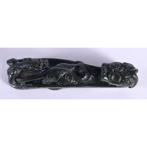 1933 - A FINE 18TH CENTURY CHINESE CARVED SPINACH JADE BELT HOOK Qianlong. 12 cm long.