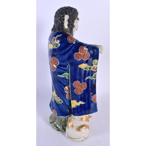 1943 - A LARGE 19TH CENTURY JAPANESE AO KUTANI PORCELAIN FIGURE modelled as a male with goat. 32 cm high.