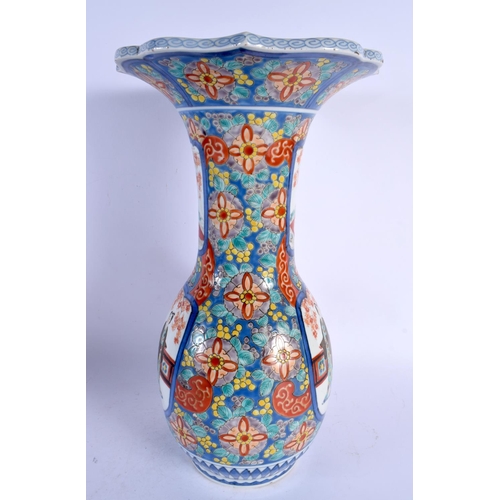 1944 - A LARGE 19TH CENTURY JAPANESE MEIJI PERIOD IMARI PORCELAIN VASE painted with figures. 40 cm x 22 cm.