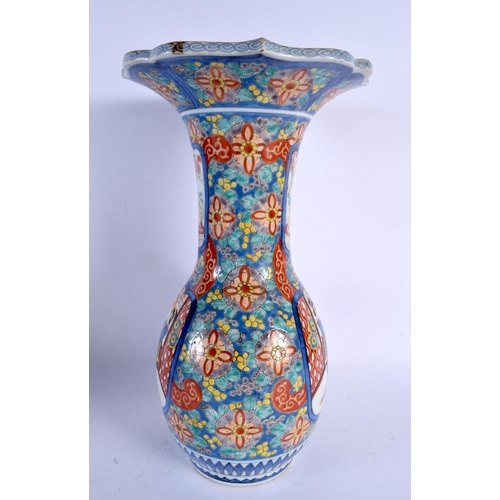 1944 - A LARGE 19TH CENTURY JAPANESE MEIJI PERIOD IMARI PORCELAIN VASE painted with figures. 40 cm x 22 cm.