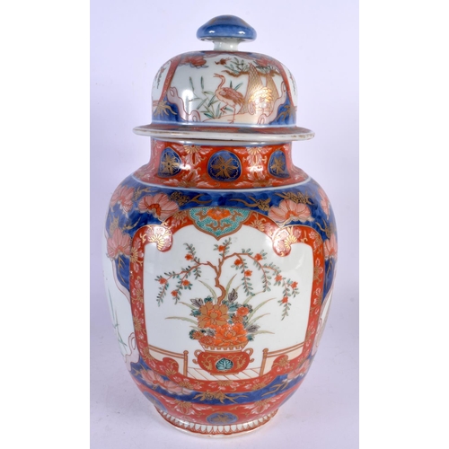 1948 - A LARGE 19TH CENTURY JAPANESE MEIJI PERIOD IMARI VASE AND COVER painted with assorted scenes. 32 cm ... 