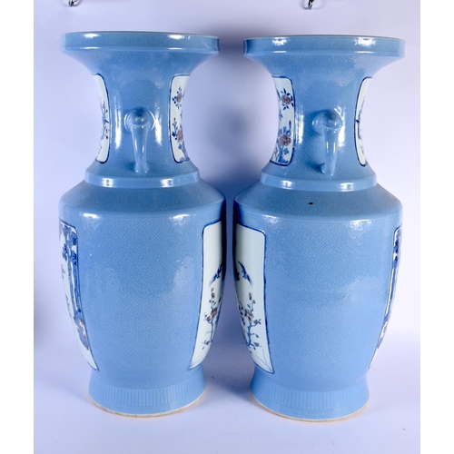 1950 - A LARGE PAIR OF CHINESE CLARE DU LUNE TWIN HANDLED PORCELAIN VASES probably 19th century, painted wi... 