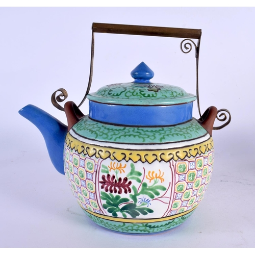 1957 - A LATE 19TH CENTURY CHINESE YIXING POTTERY TEAPOT AND COVER Qing, painted with foliage. 18 cm x 18 c... 