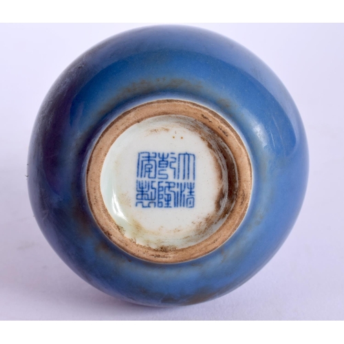 1962 - A CHINESE BLUE GLAZED PORCELAIN VASE 20th Century. 16 cm high.