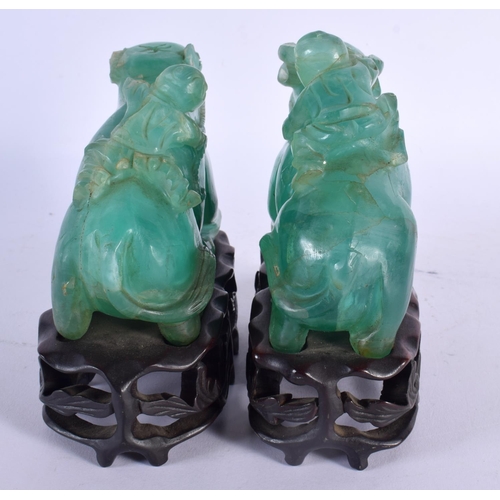 1964 - A PAIR OF 19TH CENTURY CHINESE CARVED GREEN QUARTZ BEASTS Qing. 15 cm x 15 cm.