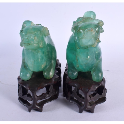 1964 - A PAIR OF 19TH CENTURY CHINESE CARVED GREEN QUARTZ BEASTS Qing. 15 cm x 15 cm.