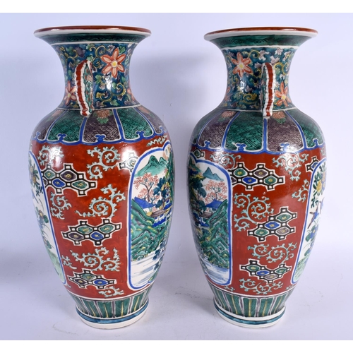 1971 - A LARGE PAIR OF 19TH CENTURY JAPANESE MEIJI PERIOD AO KUTANI PORCELAIN VASES painted with birds and ... 