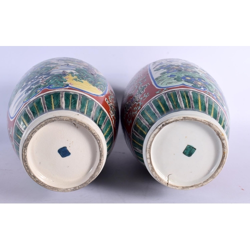 1971 - A LARGE PAIR OF 19TH CENTURY JAPANESE MEIJI PERIOD AO KUTANI PORCELAIN VASES painted with birds and ... 