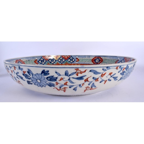 1978 - AN UNUSUAL LARGE 19TH CENTURY JAPANESE MEIJI PERIOD DEEP BASIN painted with swimming fish. 44 cm dia... 