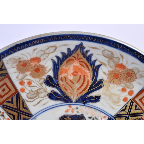 1979 - A LARGE 19TH CENTURY JAPANESE MEIJI PERIOD IMARI PLATE painted with flowers. 34 cm wide.