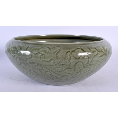 1980 - A CHINESE QING DYNASTY CELADON INCISED STONEWARE CENSER Ming style. 24 cm x 10 cm.