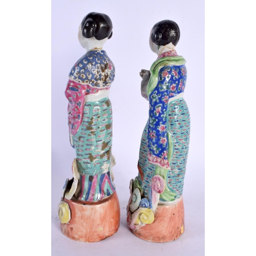 1982 - A PAIR OF EARLY 20TH CHINESE FAMILLE ROSE PORCELAIN FIGURES Late Qing/Republic. 26 cm high.