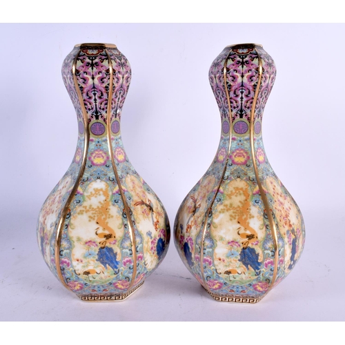 1983 - A PAIR OF CHINESE PORCELAIN VASES 20th Century. 25 cm high.