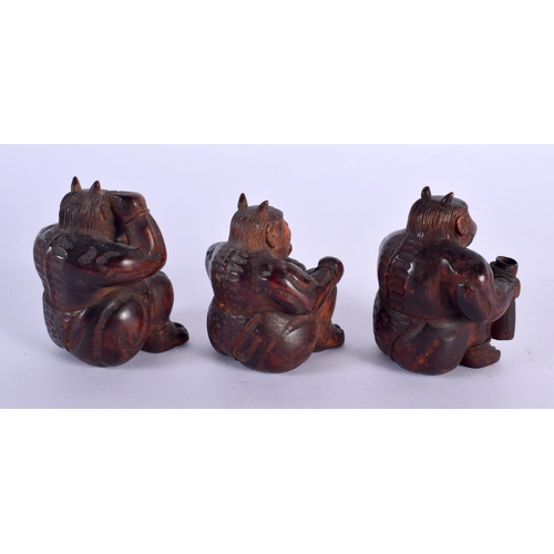 2015 - THREE 19TH CENTURY JAPANESE MEIJI PERIOD CARVED WOOD ONI OKIMONO. 7.5 cm x 5.5 cm. (3)