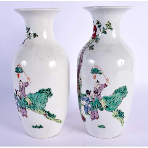 2022 - A PAIR OF CHINESE FAMILLE ROSE PORCELAIN VASES 20th Century, painted with boys in landscapes. 24 cm ... 