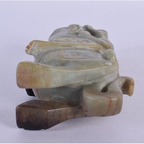 2024 - A CHINESE CARVED MUTTON JADE FIGURE 20th Century, modelled as a male with animal upon his back. 15 c... 