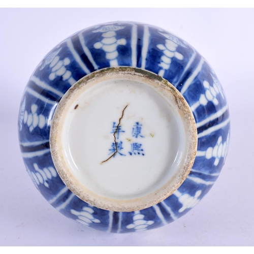 2032 - A 19TH CENTURY CHINESE BLUE AND WHITE PORCELAIN VASE bearing Kangxi marks to base. 22 cm high.