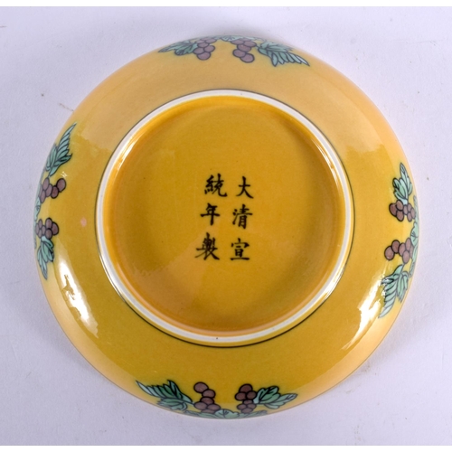 2036 - A CHINESE YELLOW GLAZED PORCELAIN SAUCER 20th Century. 13 cm diameter.