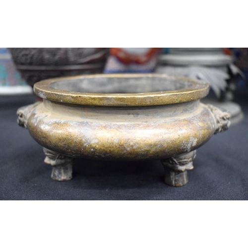 2434 - A CHINESE BRONZE CENSER 20th Century. 15 cm wide.