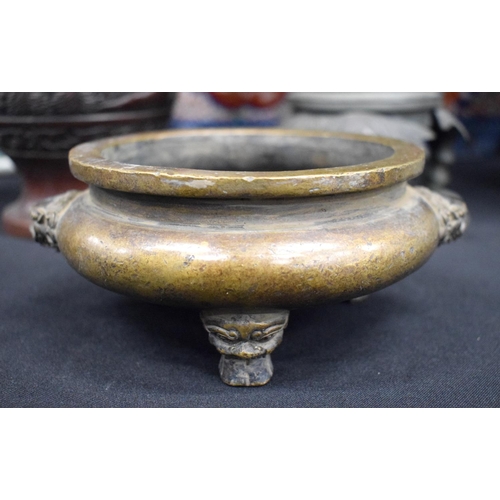 2434 - A CHINESE BRONZE CENSER 20th Century. 15 cm wide.