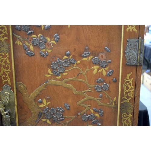 2437 - A FINE 19TH CENTURY JAPANESE MEIJI PERIOD SILVER INLAID CABINET decorated with foliage. 140 cm x 100... 