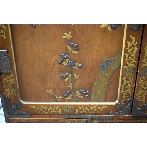 2437 - A FINE 19TH CENTURY JAPANESE MEIJI PERIOD SILVER INLAID CABINET decorated with foliage. 140 cm x 100... 