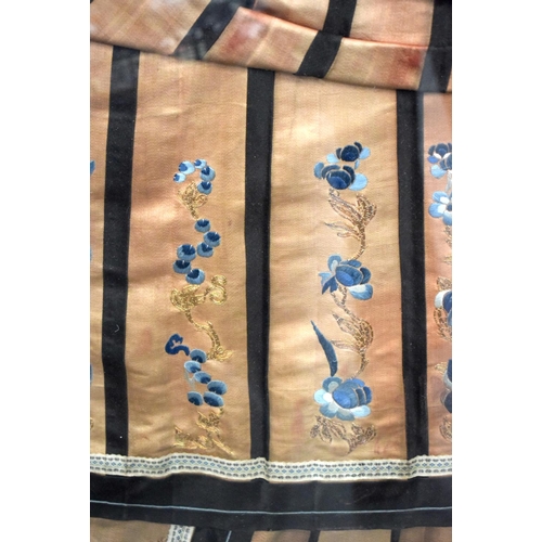 2438 - A GOOD LARGE 19TH CENTURY CHINESE ORANGE SILK WORK SKIRT decorated with flowers. 123 cm x 162 cm.