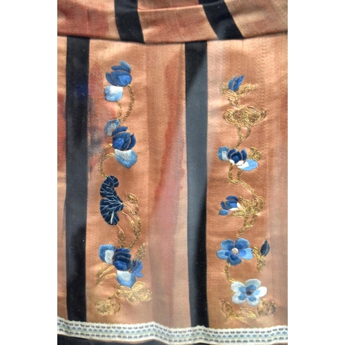 2438 - A GOOD LARGE 19TH CENTURY CHINESE ORANGE SILK WORK SKIRT decorated with flowers. 123 cm x 162 cm.