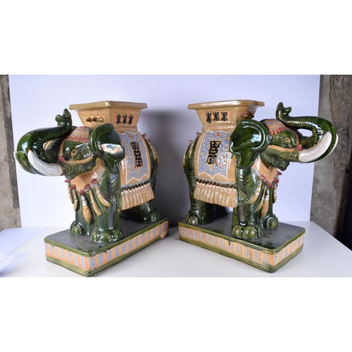 3006 - A large pair of Chinese porcelain Elephant plant stands 54 cm. (2)