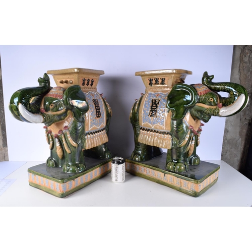 3006 - A large pair of Chinese porcelain Elephant plant stands 54 cm. (2)