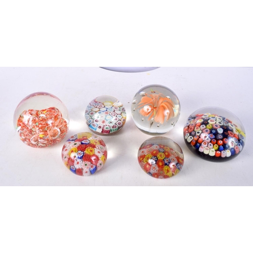 3016 - A collection of Millefiori paperweights together with two other paperweights largest 6 x 8 cm. (6).