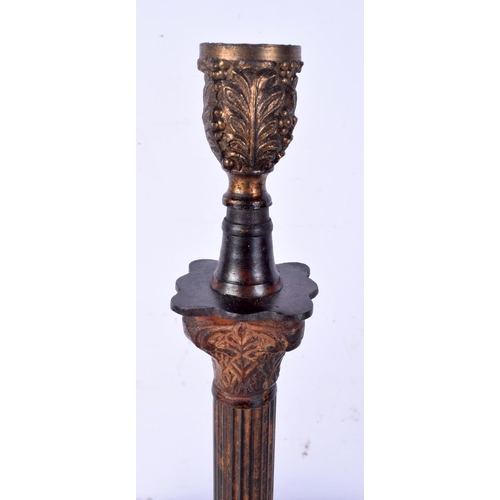 3023 - A brass candlestick possibly 18th Century together with a metal column style lampstand 36.5 cm (2).