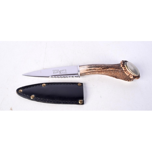 3028 - A Scottish Borders Skean Du with antler handle 20cm.