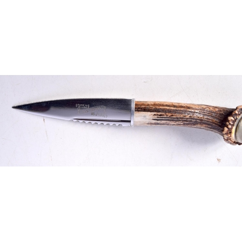 3028 - A Scottish Borders Skean Du with antler handle 20cm.