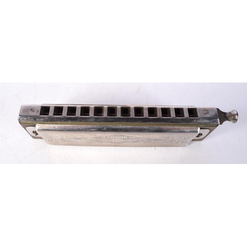 3033 - A cased Super Chromonica  by Hohner together with a Hohner Vineta No 4 harmonica