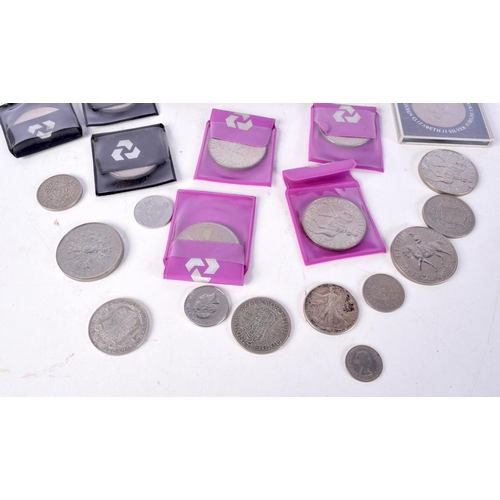 3035 - A collection of coins, Crowns ,half Dollar etc (Qty).