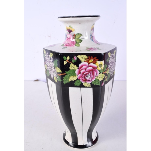 3040 - A Staffordshire hexagon sided vase decorated with roses together with a Portmeirion vase decorated w... 