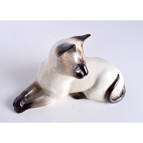 3053 - A collection of ceramic figures including a Beswick Cat, Nao, Royal Doulton largest 21 cm.(8).