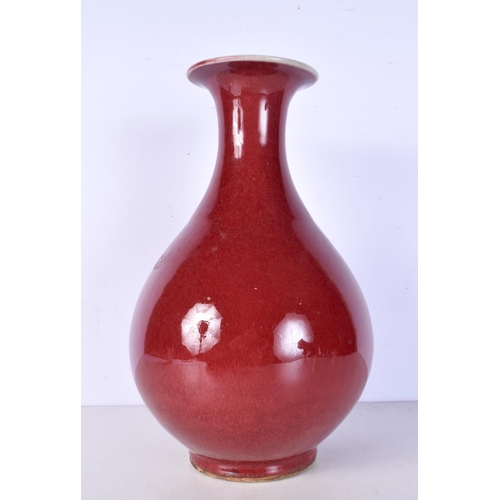 3059 - A Chinese porcelain  iron red Yuhuchunpin vase 33cm.