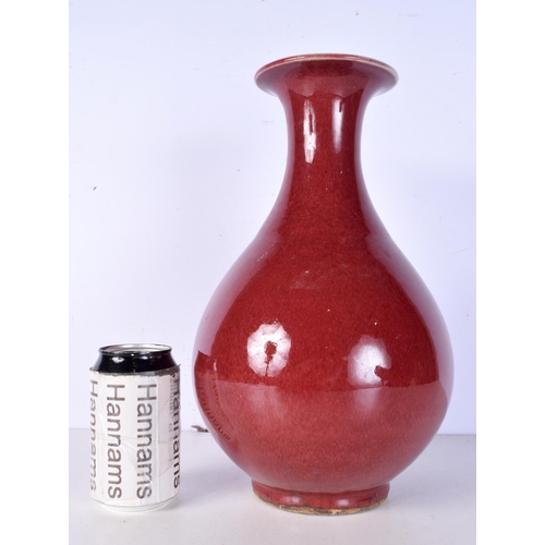 3059 - A Chinese porcelain  iron red Yuhuchunpin vase 33cm.