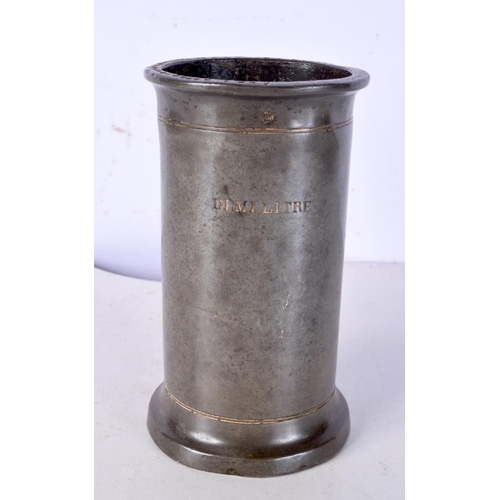 3071 - A 19th Century pewter Demi litre measure with date stamps 15 cm.