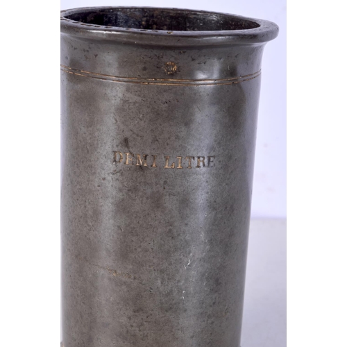 3071 - A 19th Century pewter Demi litre measure with date stamps 15 cm.