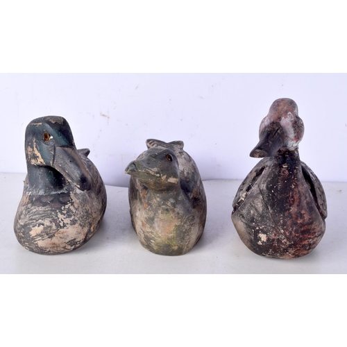 3077 - A collection of antique Wooden Duck decoys stamped to base  largest 21 cm (3).