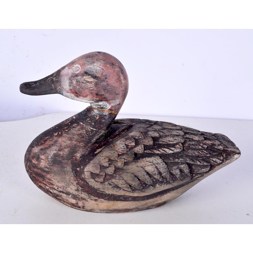 3077 - A collection of antique Wooden Duck decoys stamped to base  largest 21 cm (3).