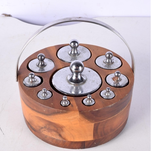 3081 - A set of weights in a fitted wooden case. Together with a Dresser style copper kettle 22 x 22 cm. (2... 