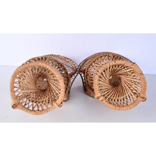 3083 - A pair of  wicker peacock chair plant stands together with a large log basket 41 cm (2).