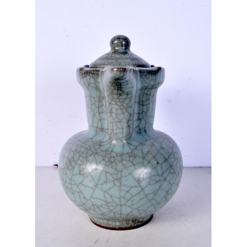 3086 - A Chinese porcelain Crackle glaze  lidded pot together with a Chinese Ox blood vase 24 cm (2).