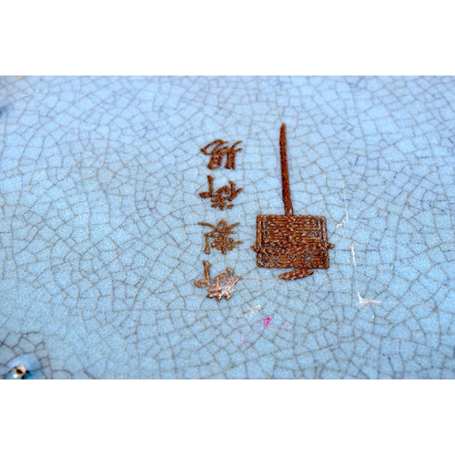 3100 - A Chinese porcelain petal shaped crackle glazed bowl decorated with Calligraphy 8 x 23 cm.