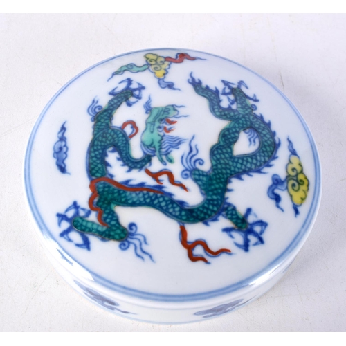 3105 - A Chinese porcelain polychrome Ginger jar decorated with Dragons 14 cm.