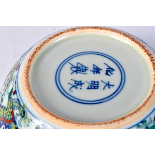 3107 - A small Chinese porcelain polychrome dragon bowl 5 x 14 cm.